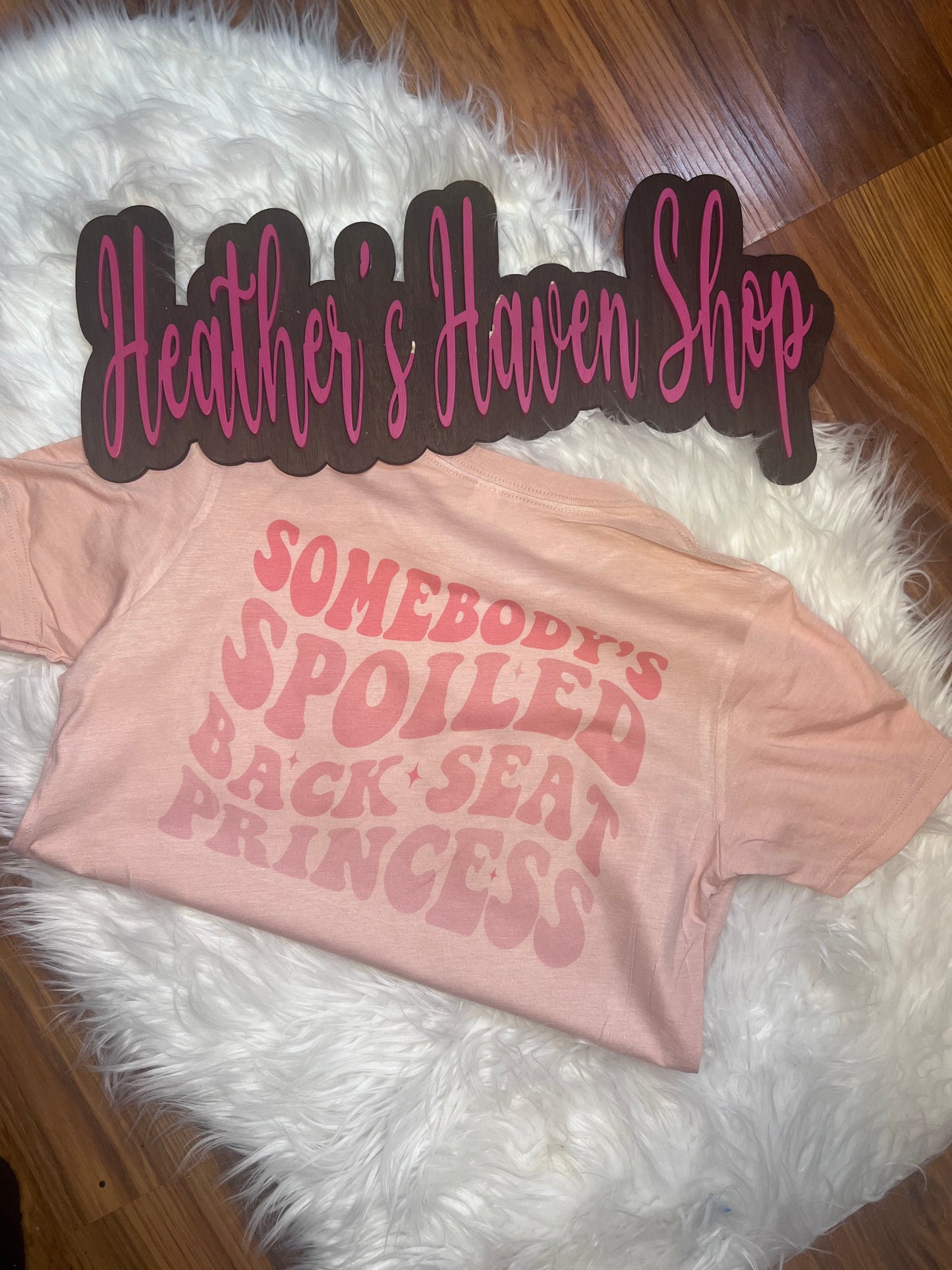 Back seat tee