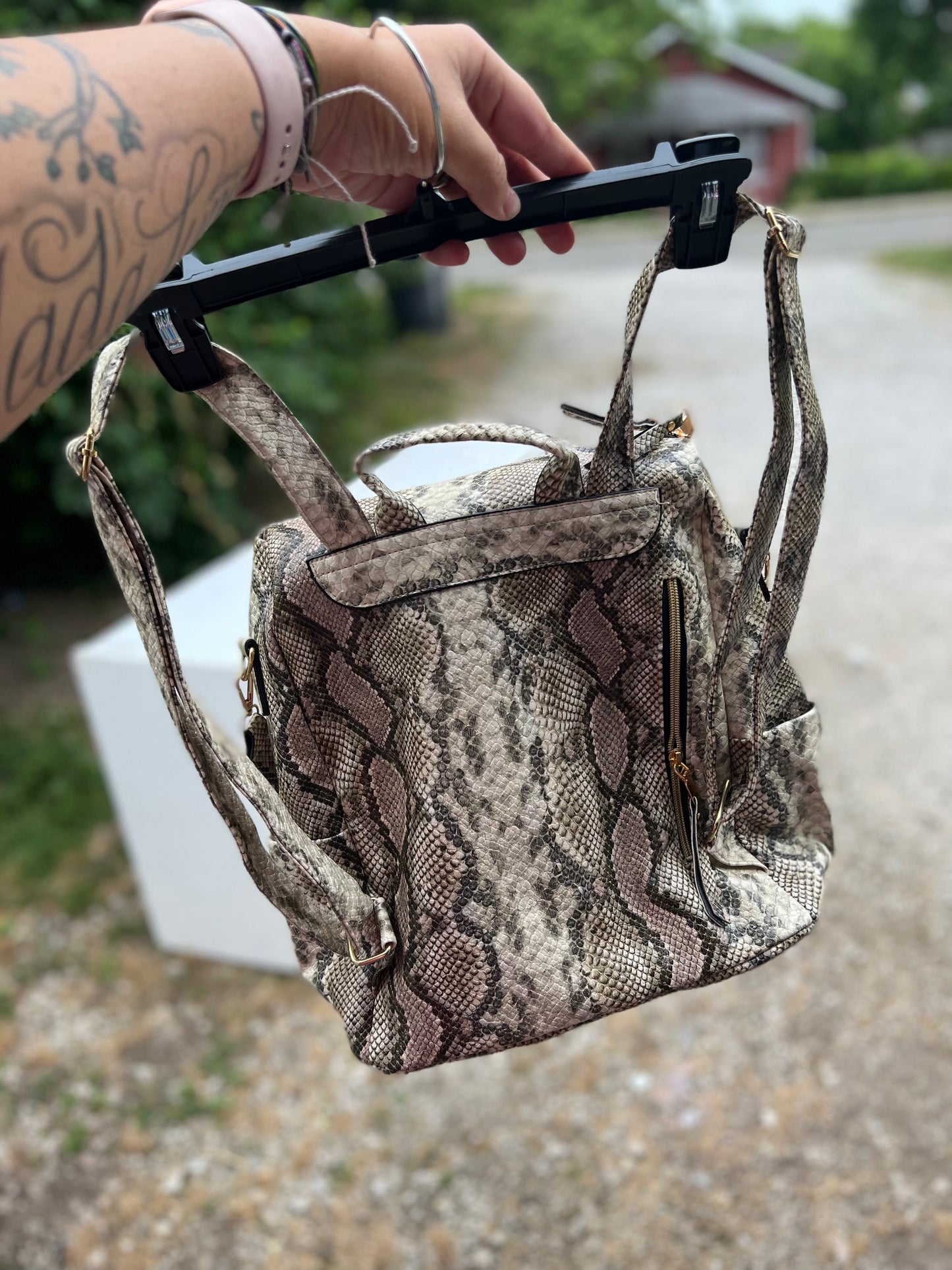 Brown snake skin guitar backpack